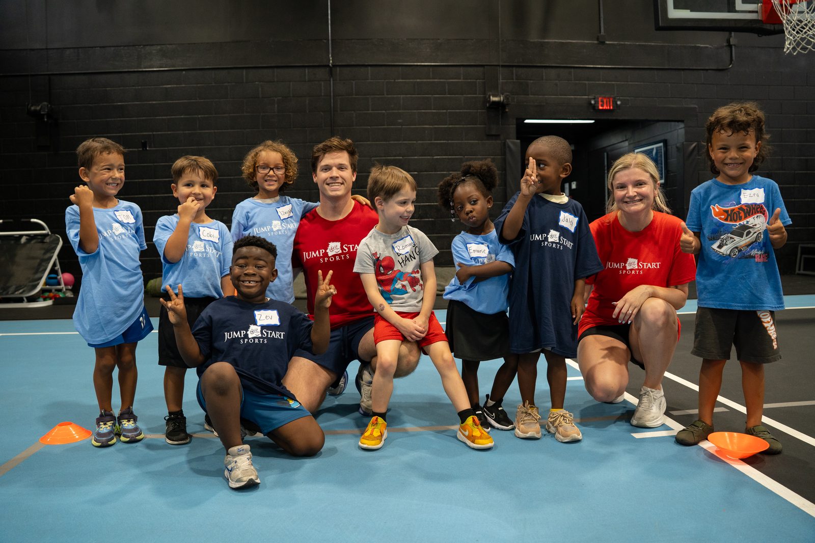 Jump Start Sports coaches with a group of kids after a session